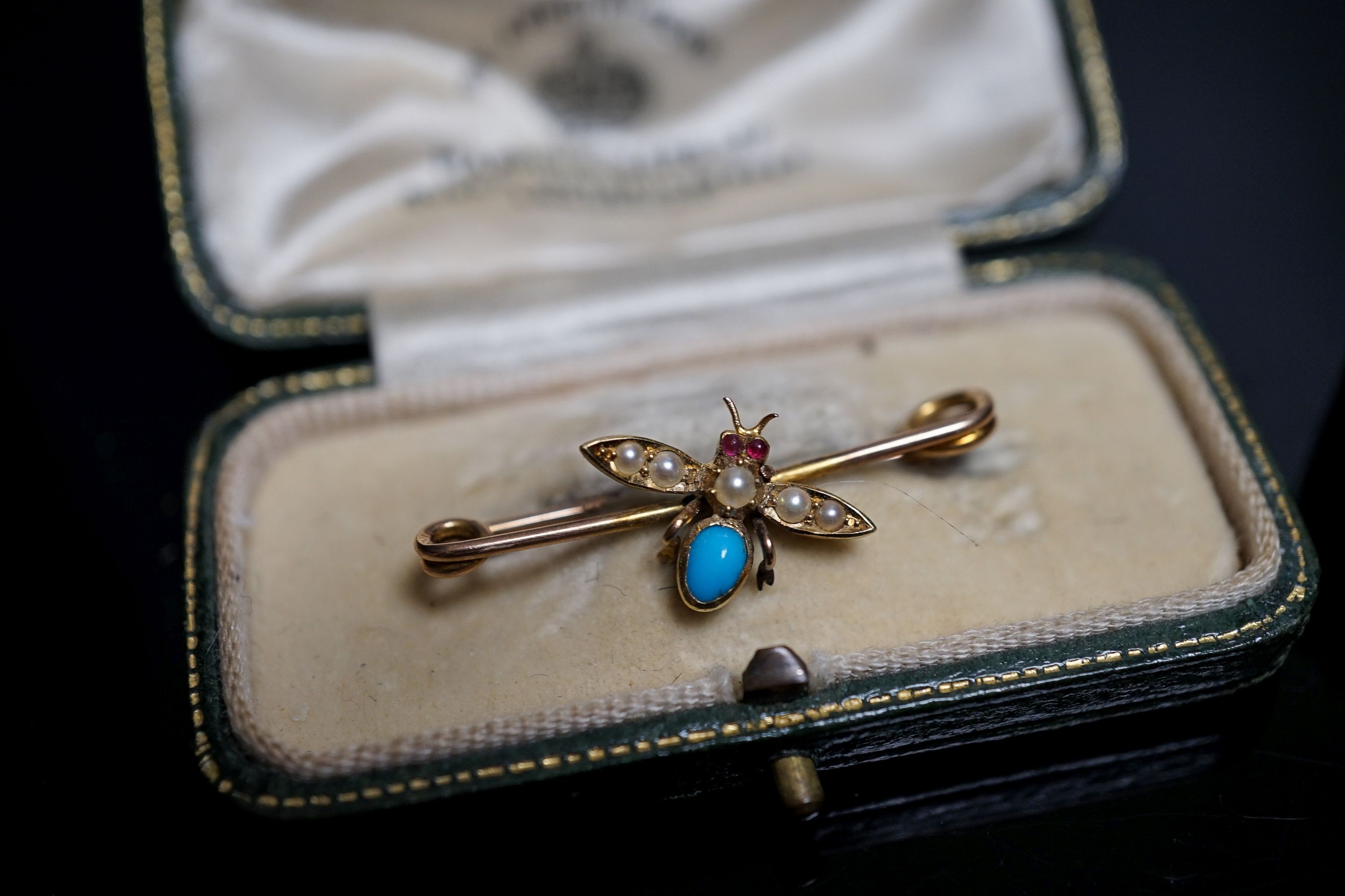 An Edwardian yellow metal and gem set bee brooch, 32mm and an SJ Philips ring box.